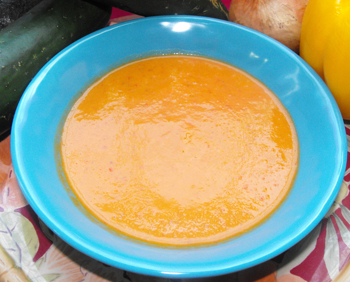 Blended butternut squash soup with red bell pepper
