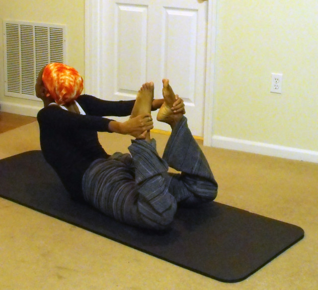 woman with fibroids yoga
