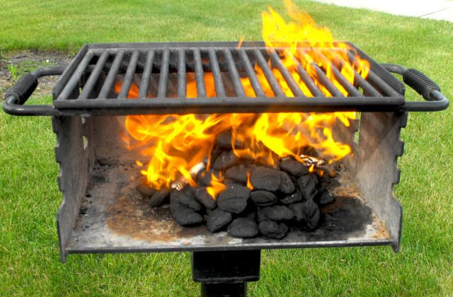 photo of lit coals on grill taken by Monica July 4th 2014
